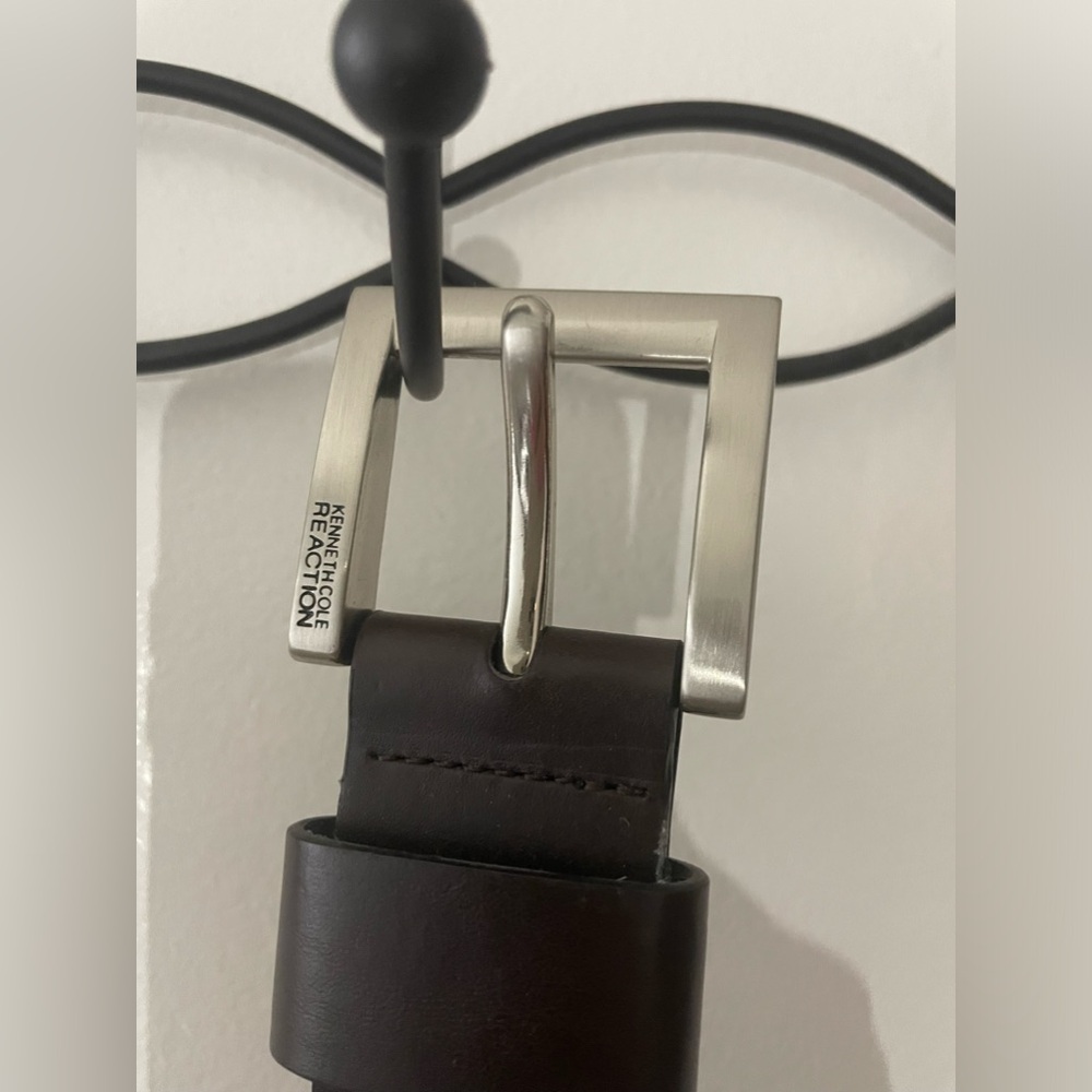 Kenneth Cole dark brown belt. Size 34.